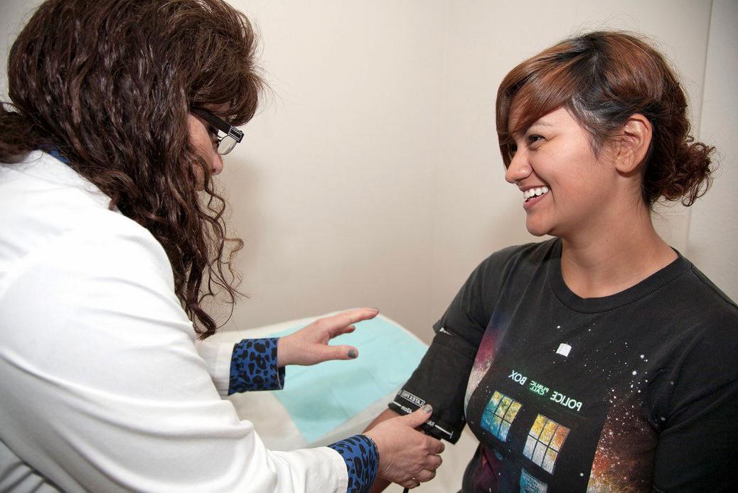 A student is seen by a nurse in the health center